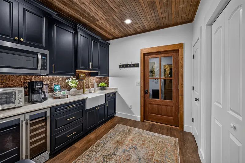 Coffee bar, microwave and wine refrigerator in the kitchenette